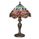 Dragonfly Tiffany table lamp with a dark bronze finish and a colorful stained glass shade.