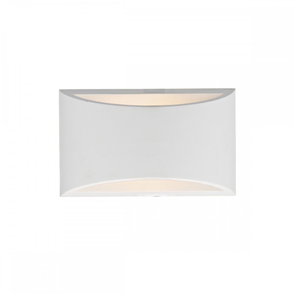 A white wall sconce with light glowing from the top and bottom edges. It is rectangular.