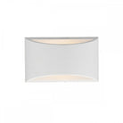 A white wall sconce with light glowing from the top and bottom edges. It is rectangular.
