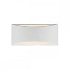A sleek, white, curved wall light emitting warm light upwards and downwards.
