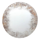 A round mirror with a distressed, antiqued silver and gold frame against a white background.