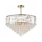 A dazzling tiered crystal chandelier with a brass finish, showcased on a clean white background.