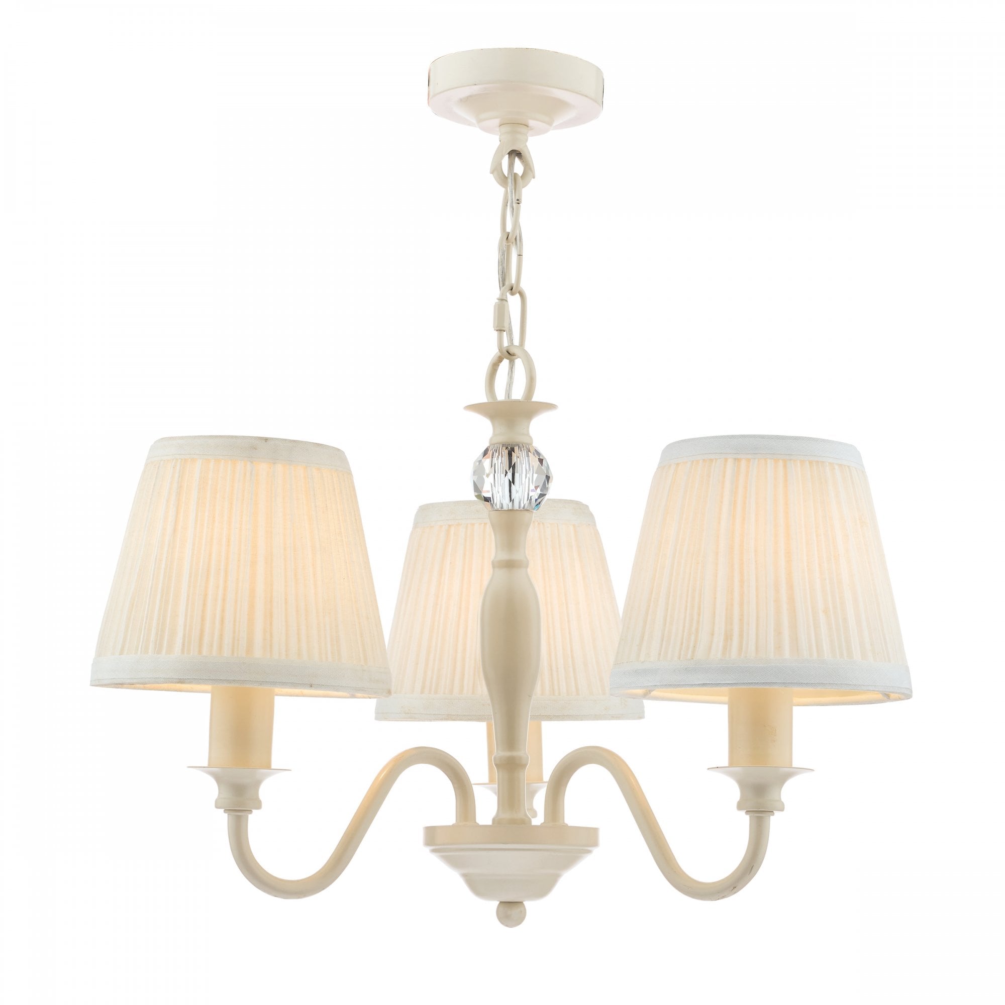 A cream-colored three-arm chandelier with pleated fabric shades and a glass accent.