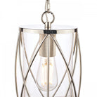 A close-up of the polished nickel pendant light with a clear glass shade.