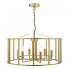 A brass chandelier with six exposed bulbs, encased in a stylish cylindrical cage design.