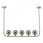 A contemporary linear pendant light featuring five reflective smoky glass globes.