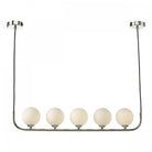 Five white spherical lights are suspended from a chrome bar in this modern ceiling fixture.