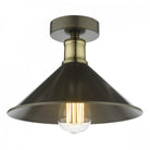 Industrial-style flush mount ceiling light with a black shade and brass accents.