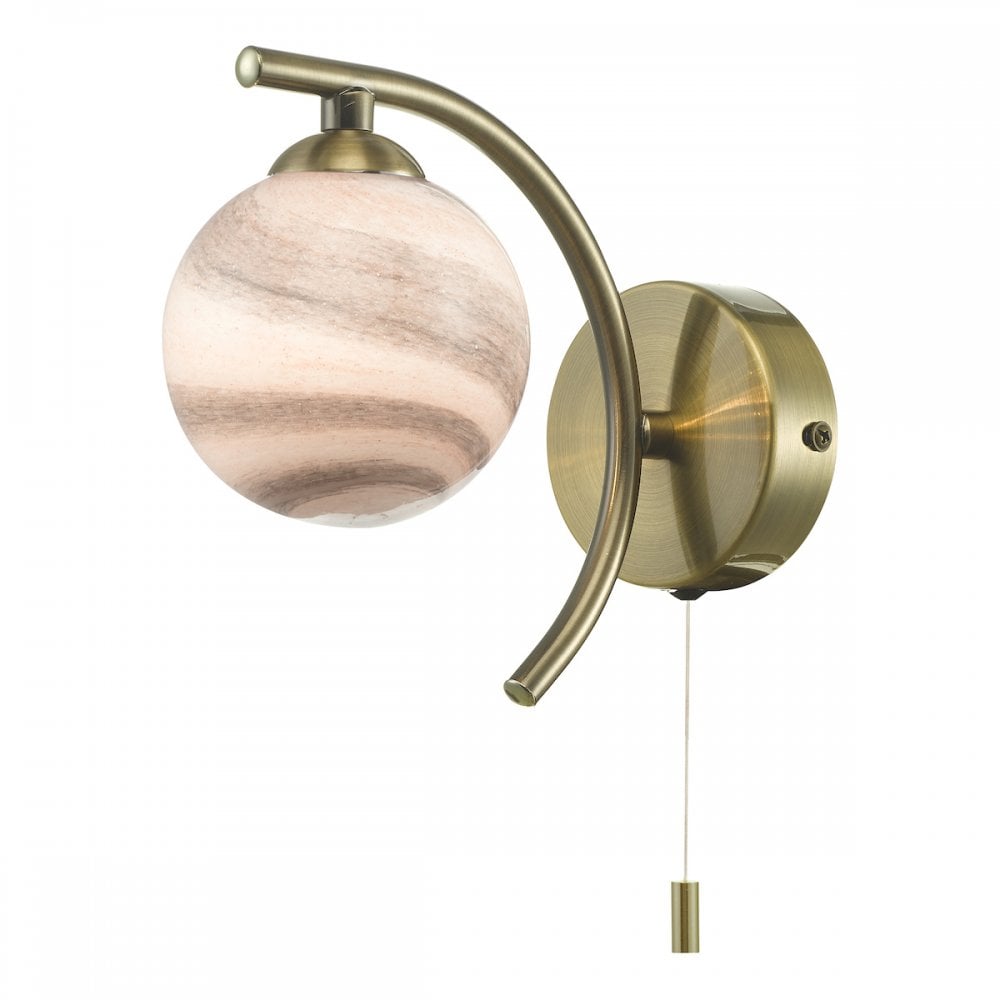 A brass wall light with a marbled globe shade and a pull cord switch for convenience.