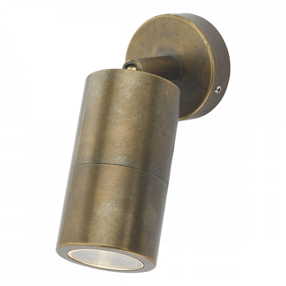 A close-up of a brass wall light with a downward-facing beam, perfect for outdoor use.
