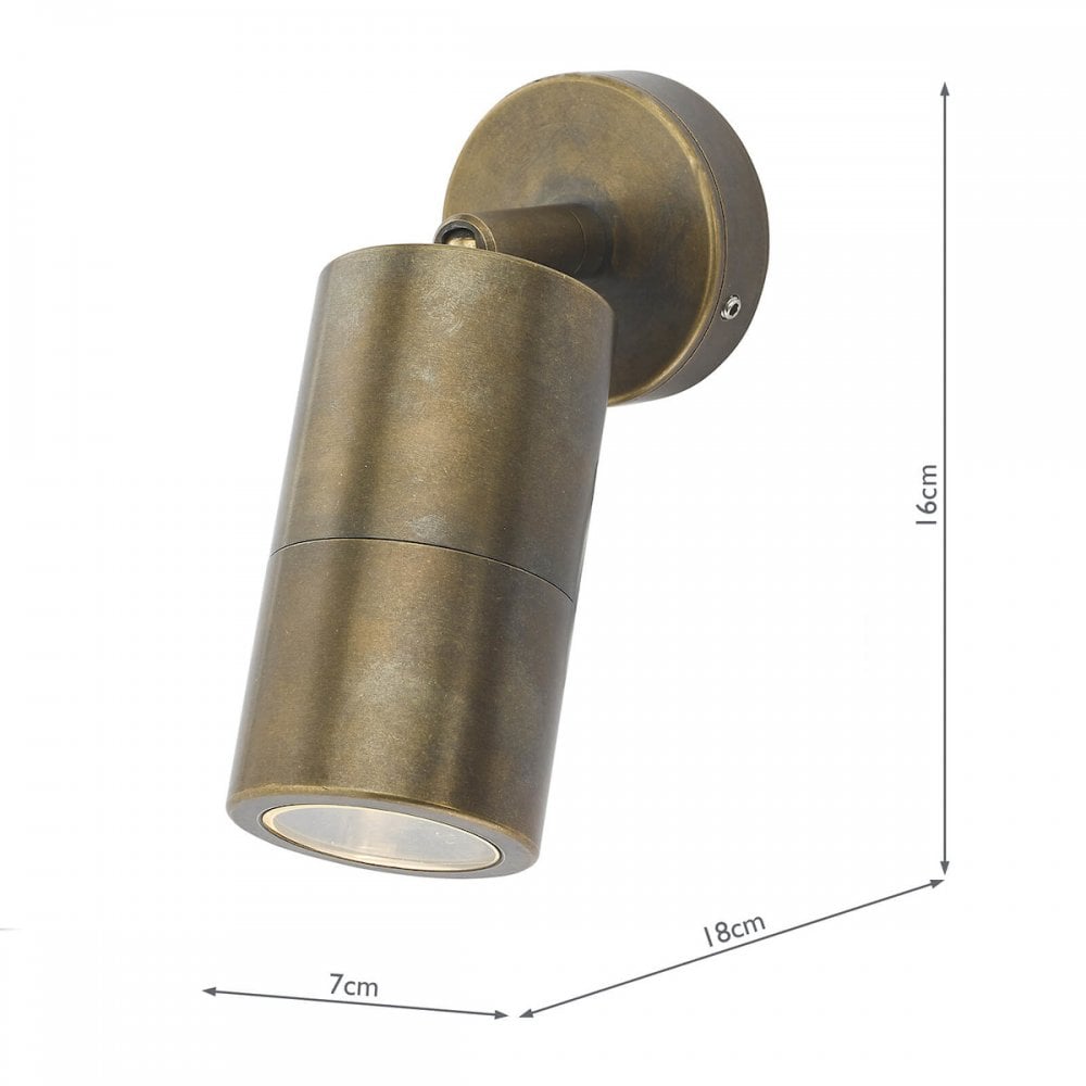 A brass wall light with dimensions of 7cm width, 16cm height, and 18cm depth.