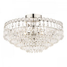 A close-up view of a crystal chandelier, showcasing its intricate design.