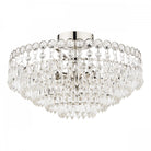 A close-up view of a crystal chandelier, showcasing its intricate design.