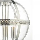 Detailed view of the ornate band on a polished nickel pendant light with glass.