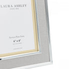 A close up of the corner detail of a 4x6 inch Laura Ashley photo frame.