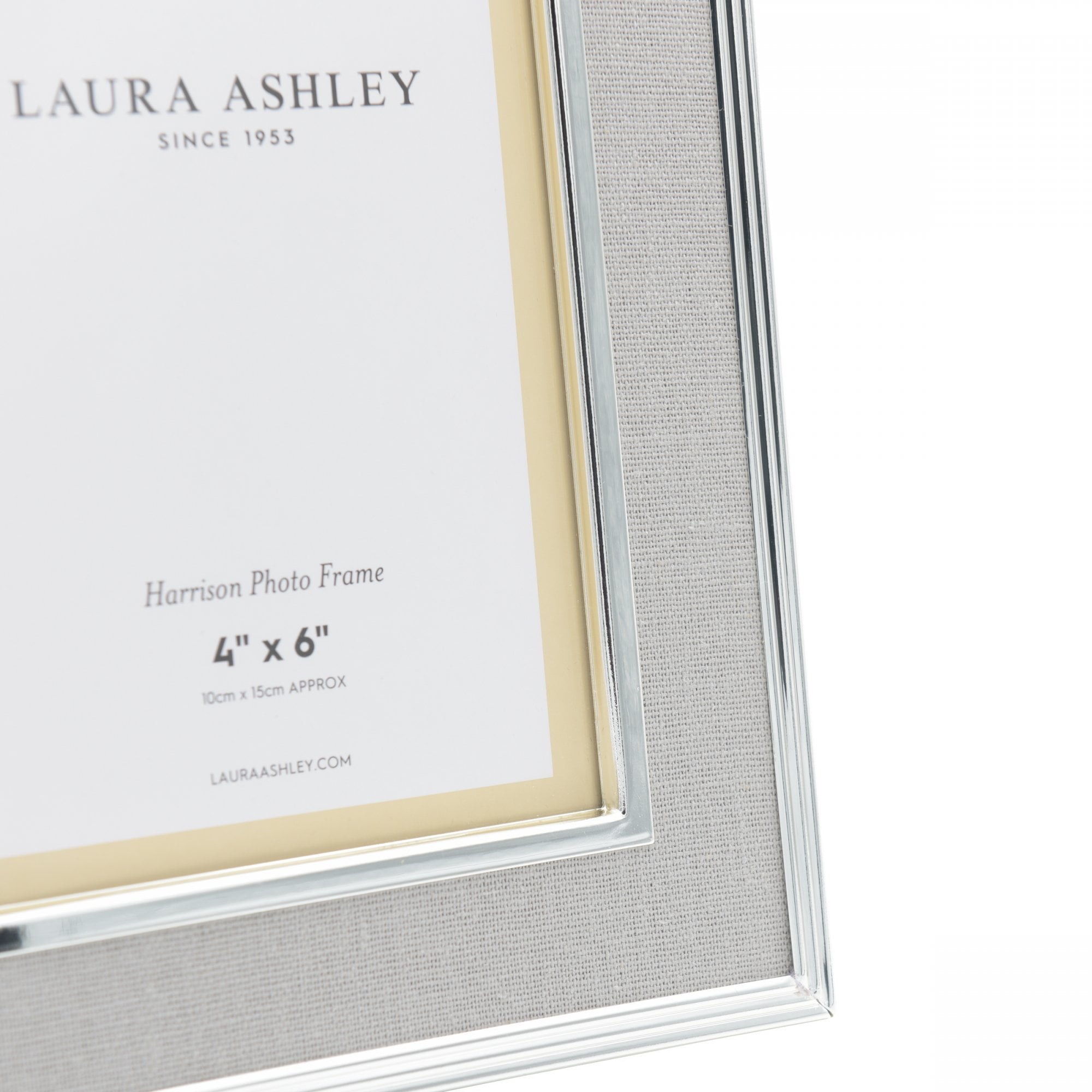 A close up of the corner detail of a 4x6 inch Laura Ashley photo frame.