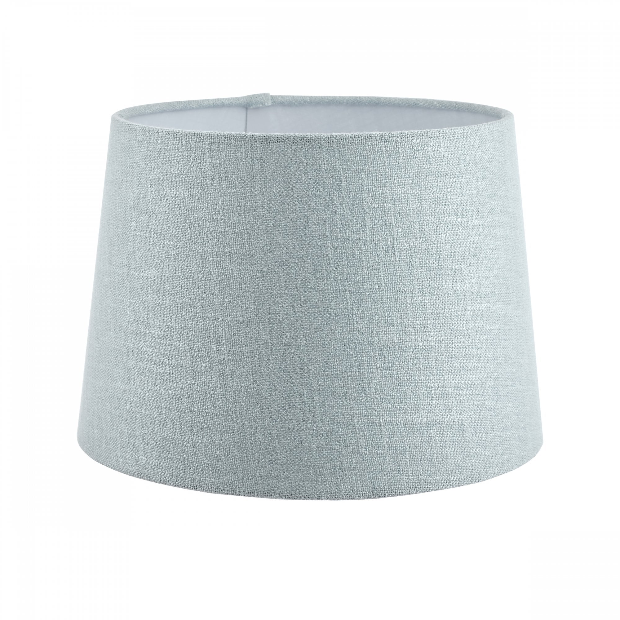 An extra-large light blue fabric lamp shade with a delicate texture, versatile for home decor.