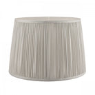 Pleated soft grey lamp shade.