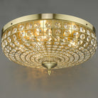 An ornate crystal-encrusted ceiling light with a gold base.