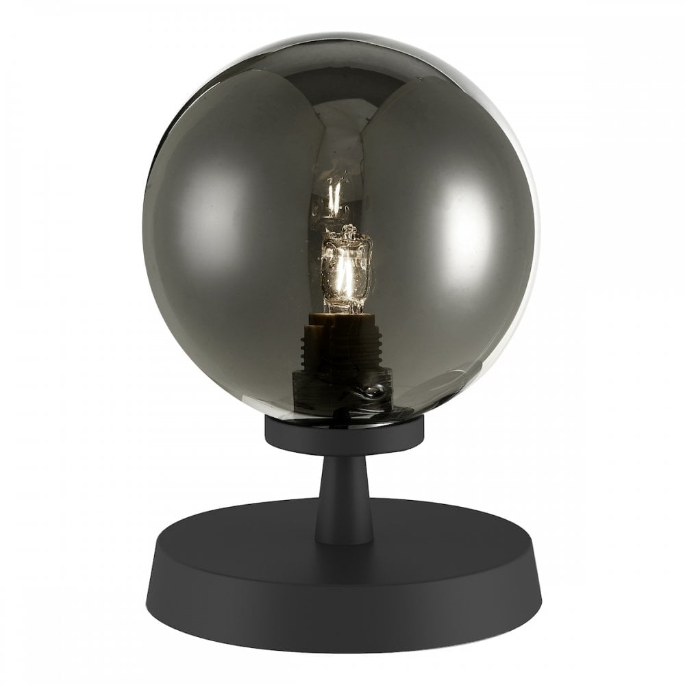 Table lamp with a smoked glass sphere and a visible bulb on a black base.
