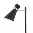 Close-up of the adjustable black cone-shaped shade and chrome accents of a table lamp.