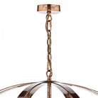 Close-up of the chandelier's ceiling rose and chain, showcasing its antique finish.