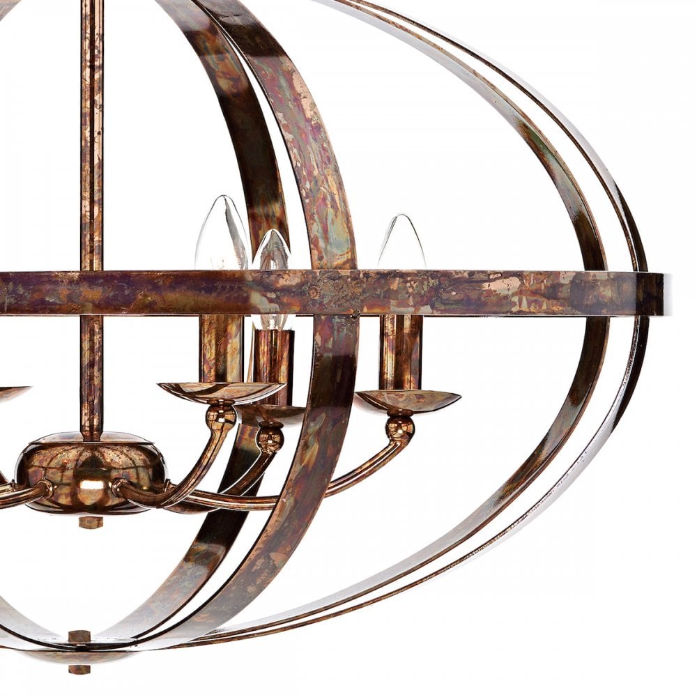 A close-up view of the chandelier's five lights within its metallic orb frame.