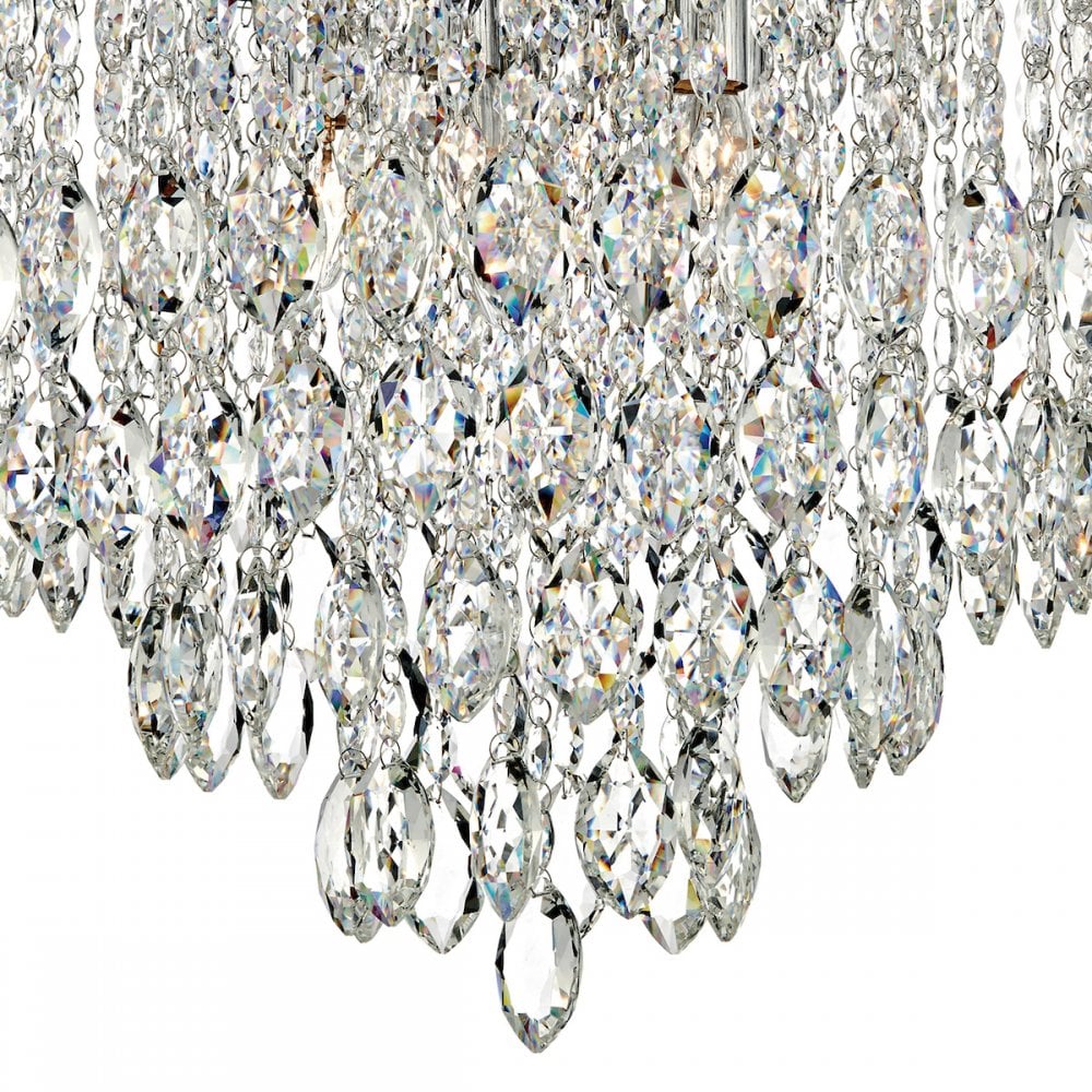 A detailed view of the individual teardrop-shaped crystals on the chandelier.
