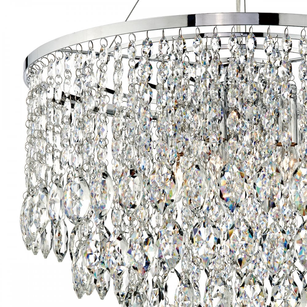 A side view of the chandelier, highlighting the layers of cascading crystal adornments.