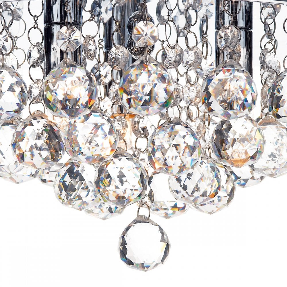 A close-up view of the crystal ceiling light showing the intricate crystal details.