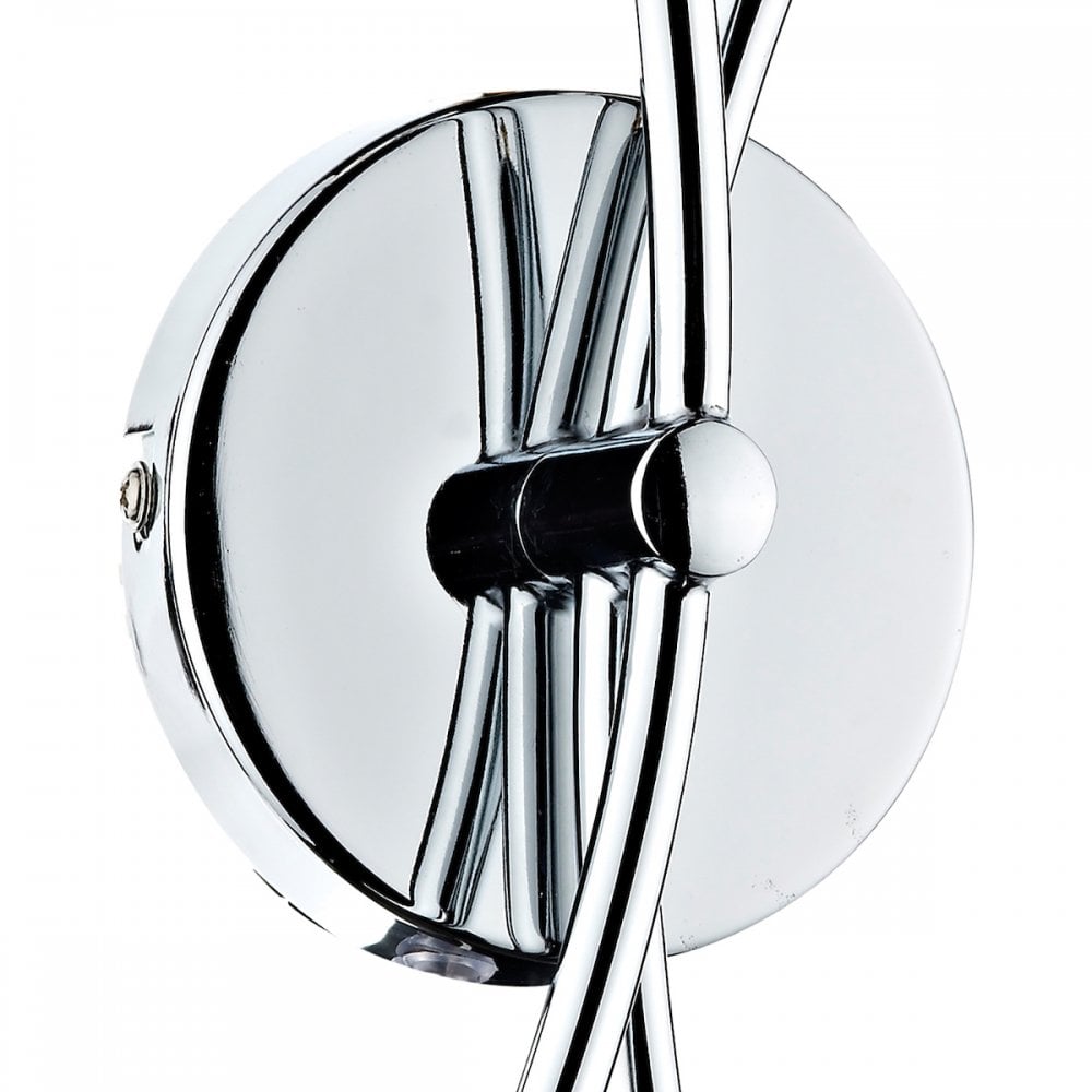 Close-up of the chrome circular base of the wall sconce, showing the arm attachment.