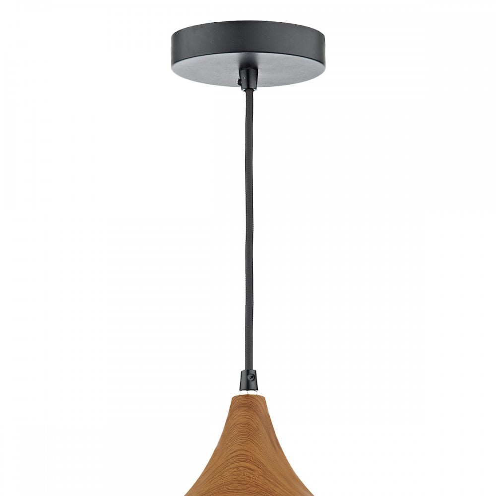 Top portion of pendant light with black canopy and wood accent.