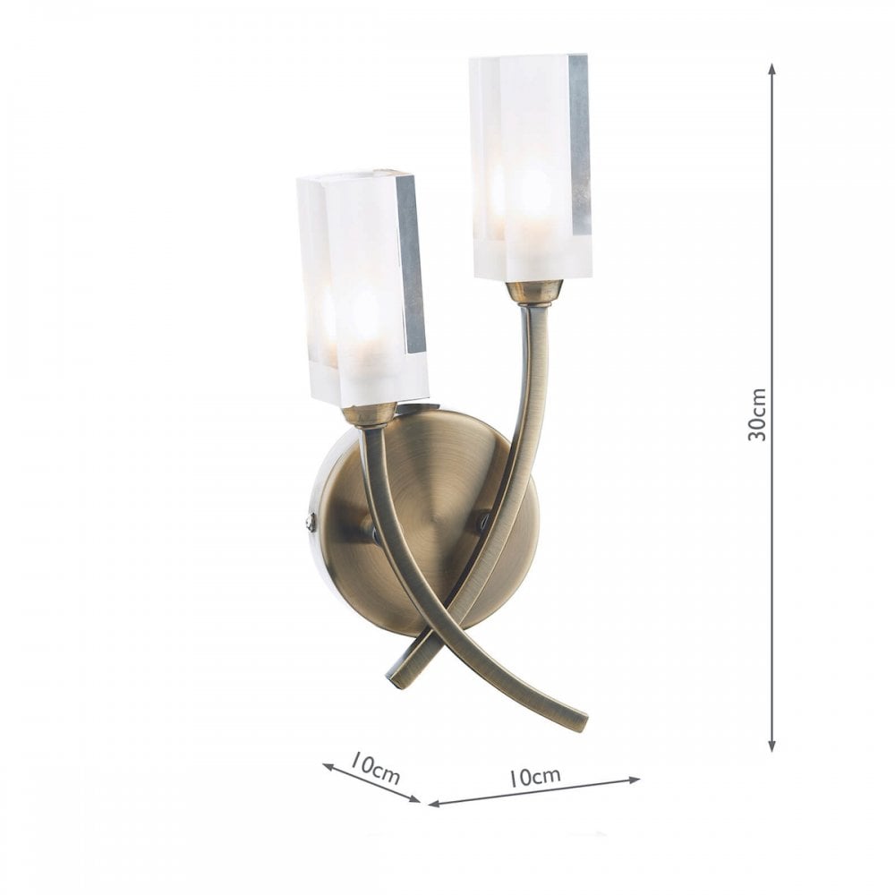 Antique brass wall light with two clear shades and dimensions of 30cm H x 10cm W.