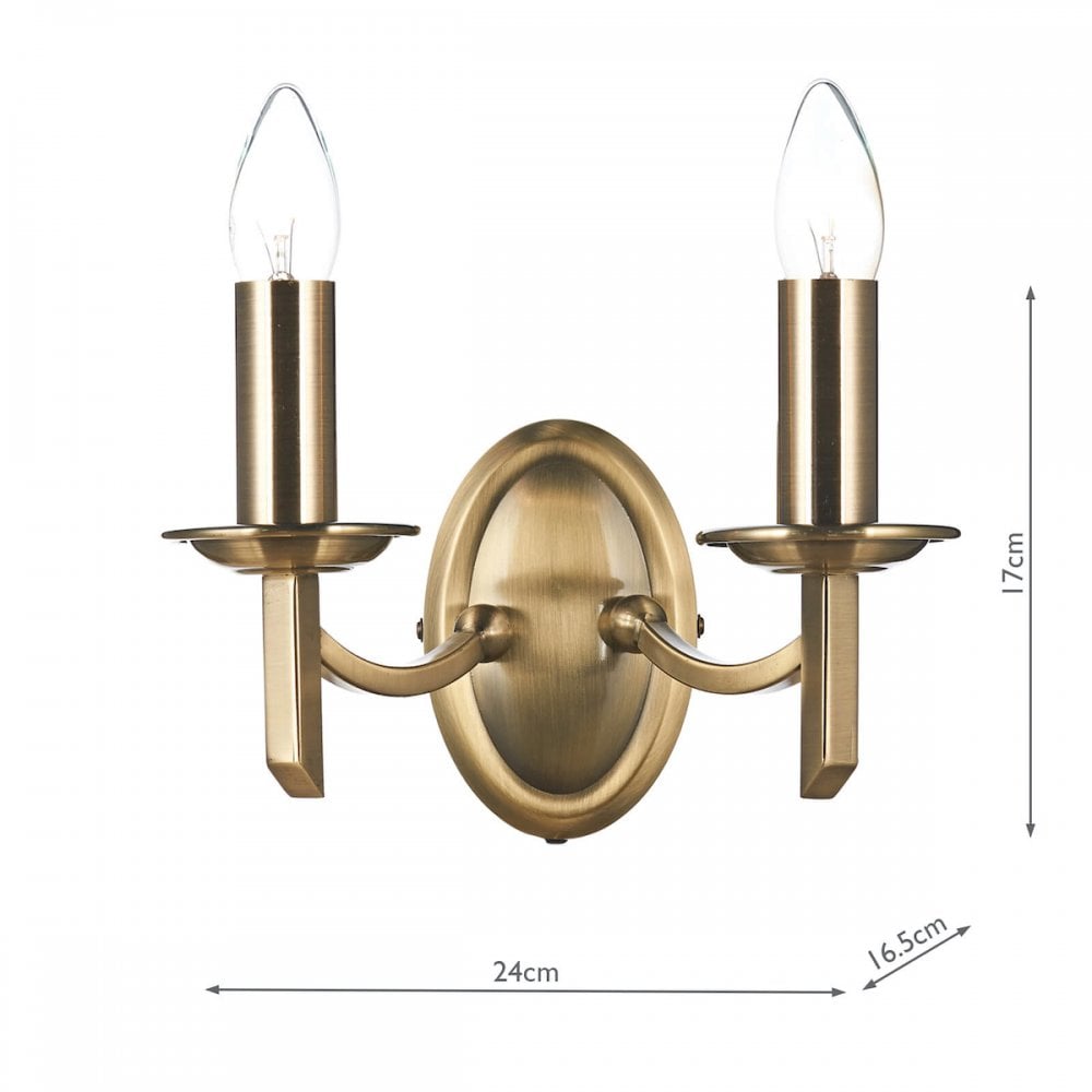 Brass twin wall light fixture with dimensions of 24cm width and 17cm height.