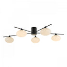 Black and white modern ceiling light with five orb-shaped diffusers.