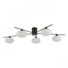 Black and white modern ceiling light with five orb-shaped diffusers.