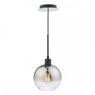 A modern smoked glass pendant light with a visible filament bulb.