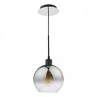 A sleek pendant light with a smoked glass spherical shade and an exposed filament bulb.