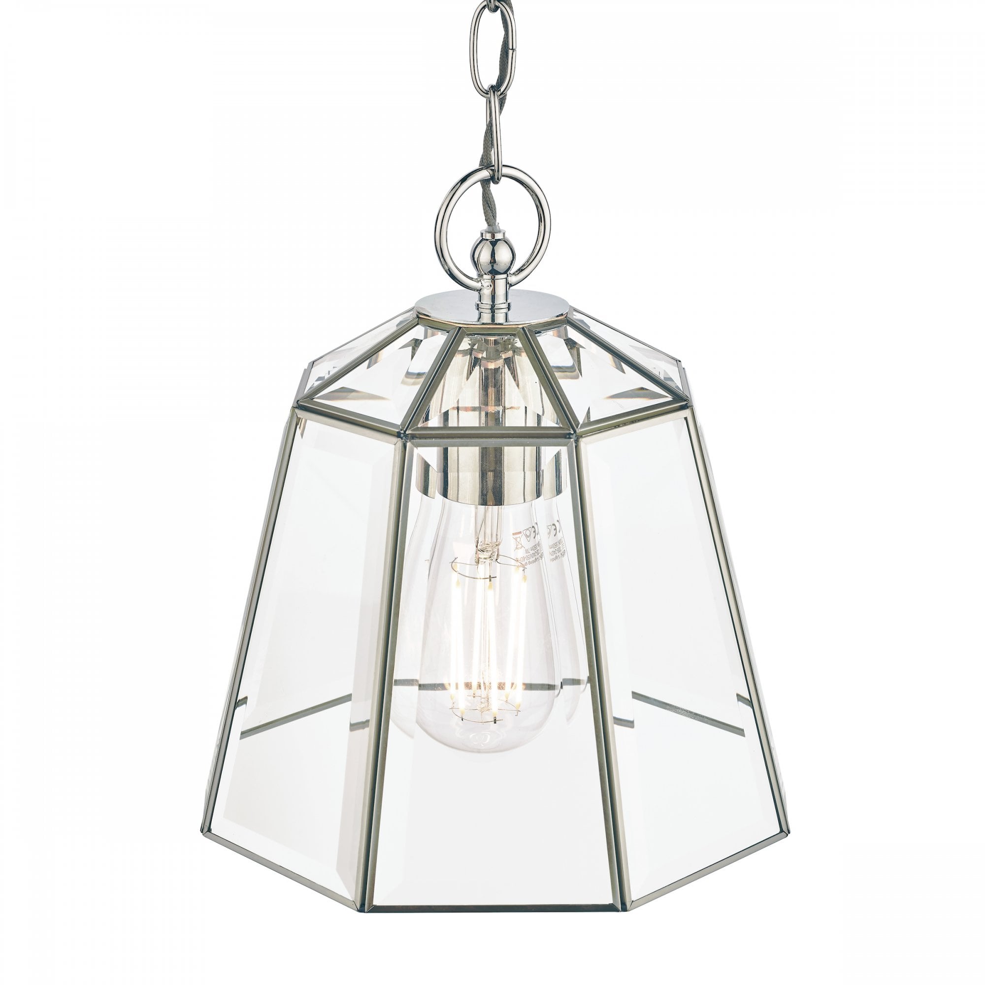 Close-up of polished nickel pendant light with clear glass shade and exposed bulb.