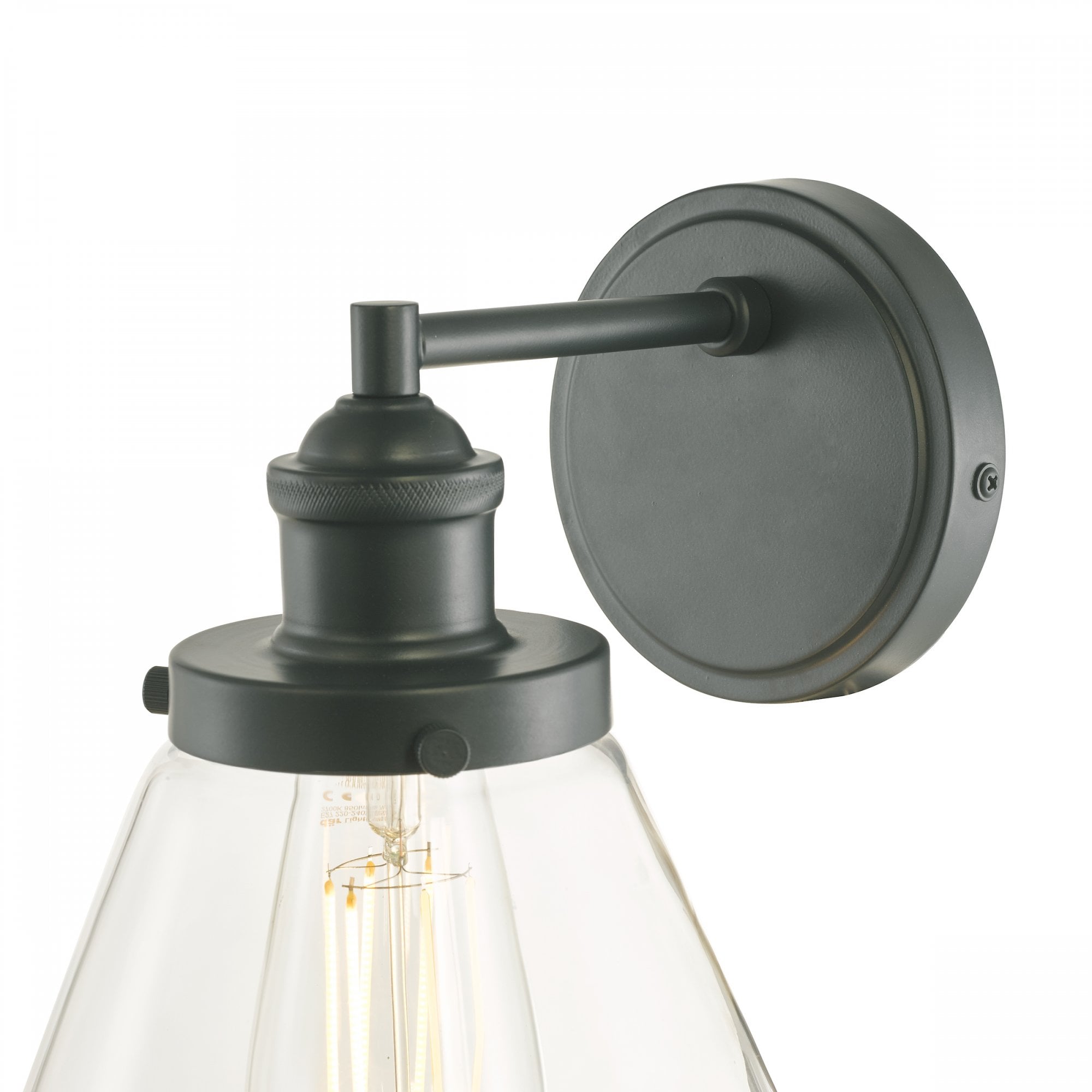Close-up of the vintage outdoor wall light with a black fixture and clear glass shade.