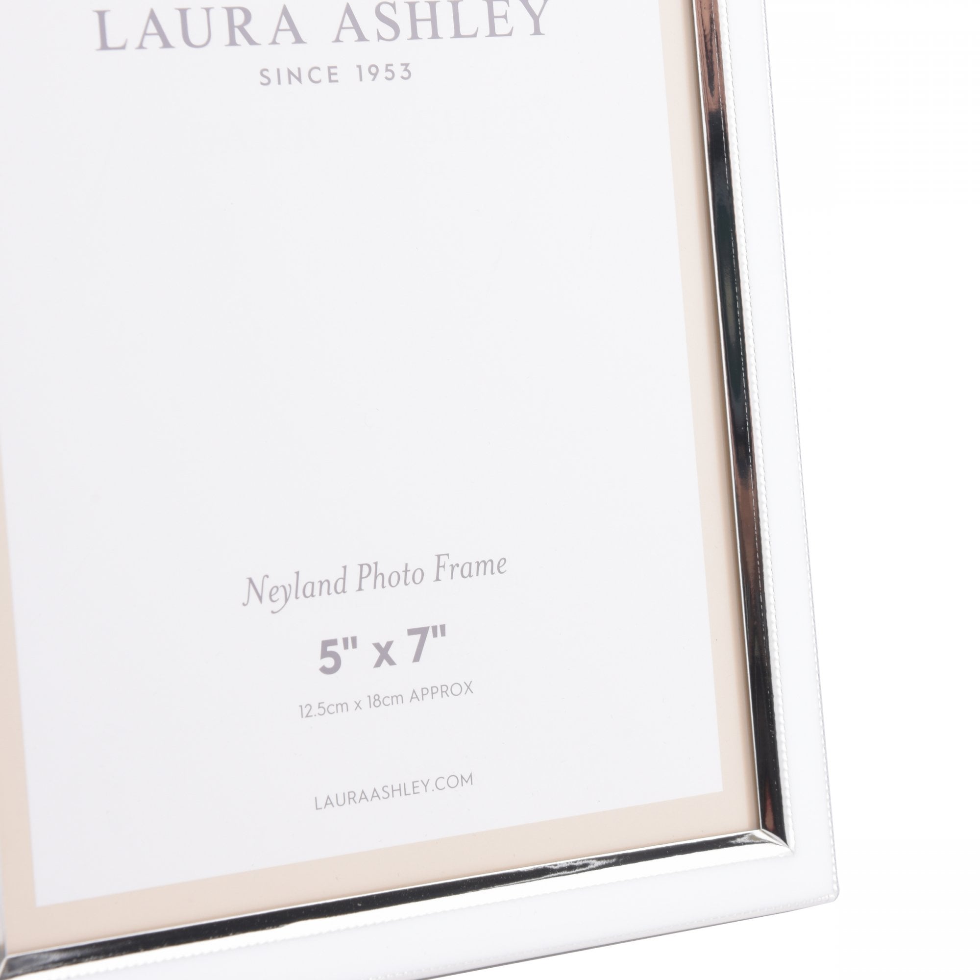 A close-up of the Laura Ashley Neyland 5" x 7" photo frame with product details.