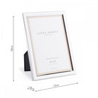 A shiny silver Laura Ashley Neyland 5" x 7" photo frame with dimensions shown.