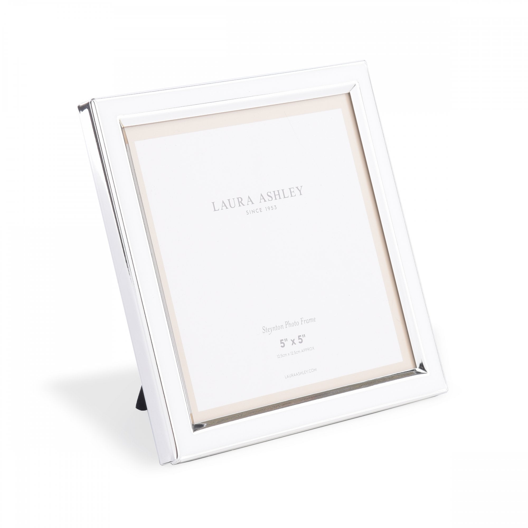 A white 5" x 5" photo frame by Laura Ashley is displayed with a stand.