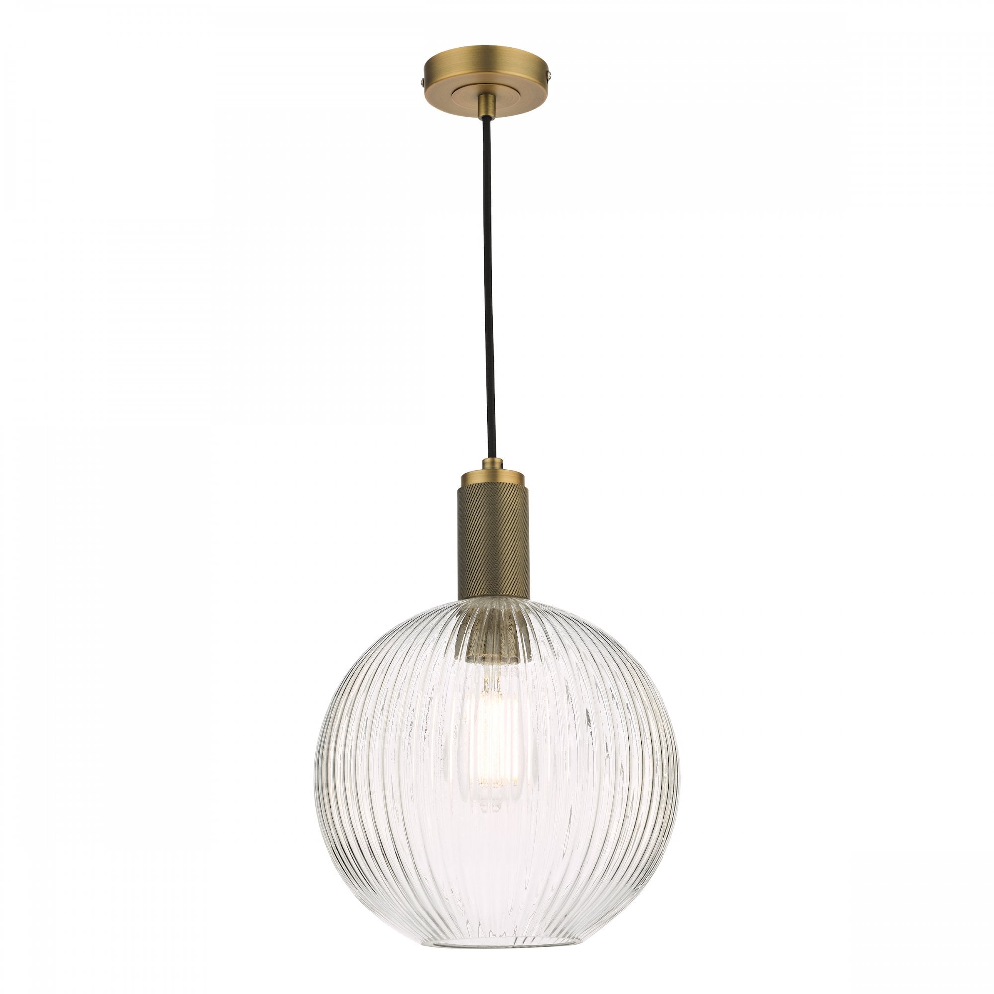 A close-up of a clear, ribbed glass globe pendant light with a brass fixture.