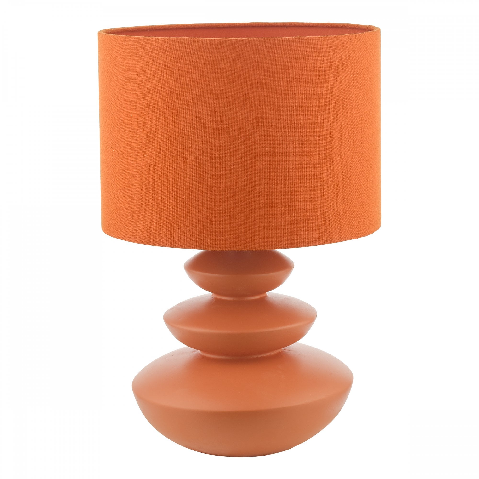 An orange table lamp with a three-tiered base, providing a warm glow to any room.