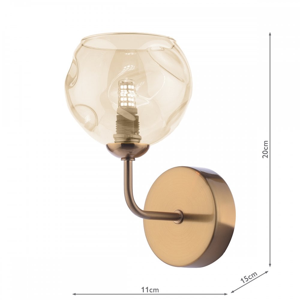 A wall light with an amber glass shade, shown with its dimensions.