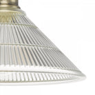 A close-up of the fluted glass shade of the semi-flush ceiling light.