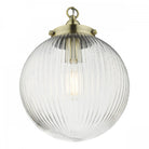 A clear, ribbed glass globe pendant light with brass top, featuring a visible bulb inside.