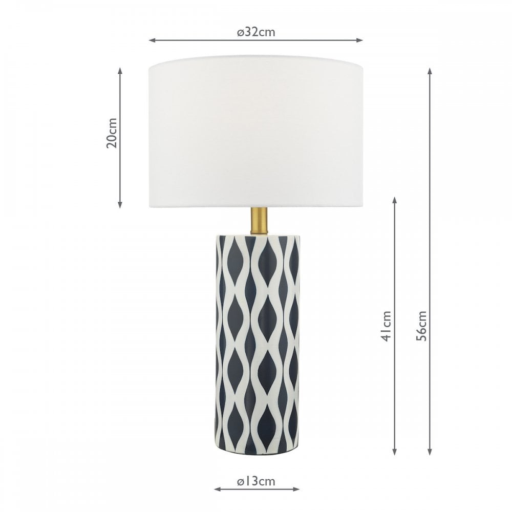 A white table lamp with a dark blue and white patterned base, showing dimensions.