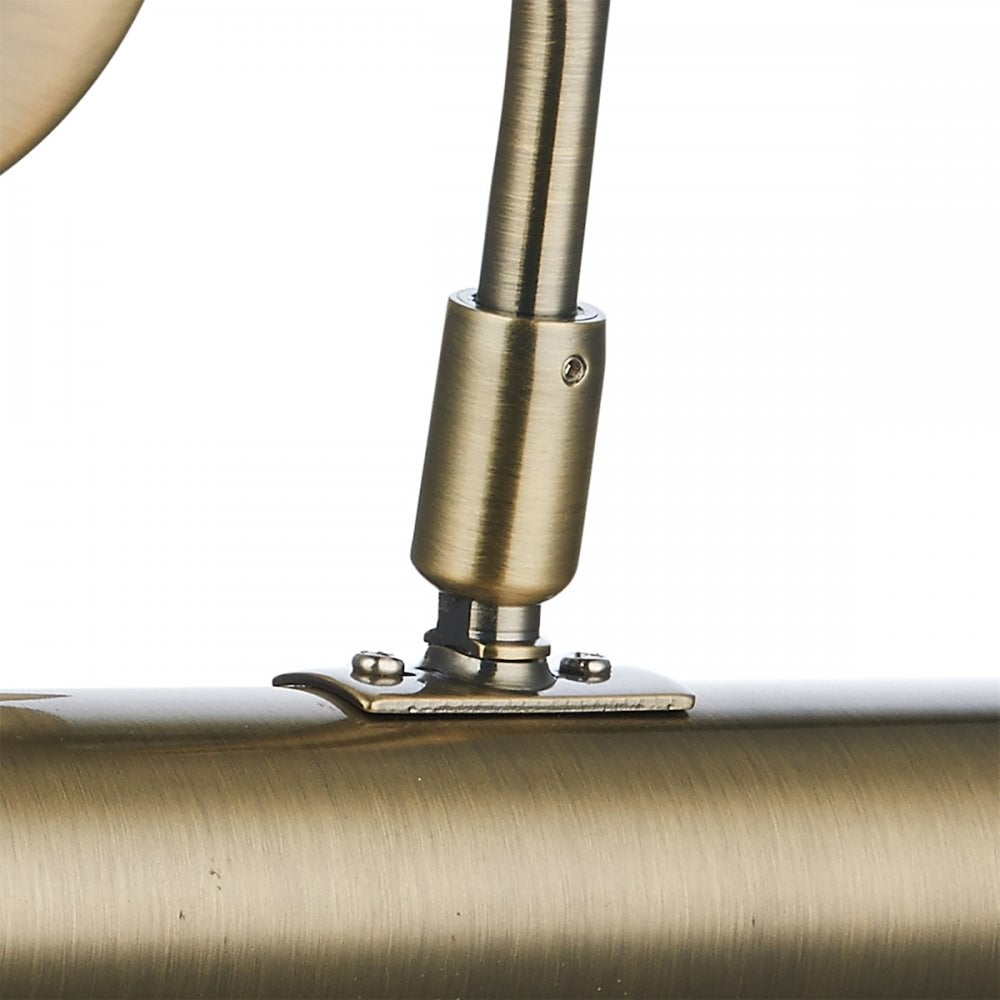 A close-up of the adjustable joint connecting the arm to the light bar.